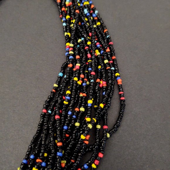 Multi strand black seed bead necklace with bright bead accents - Picture 8 of 13